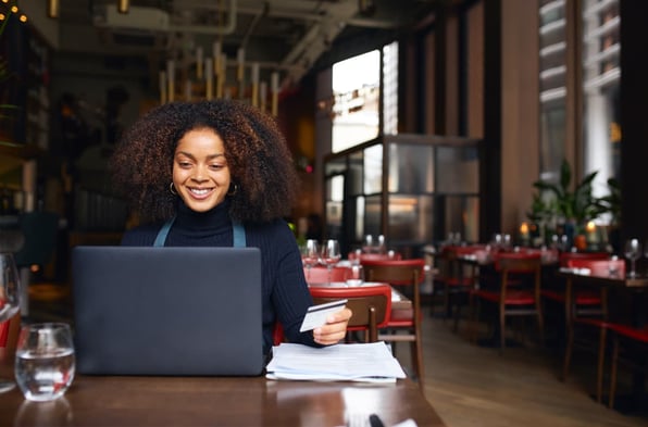 Lady reviewing customer financing programs for her small business
